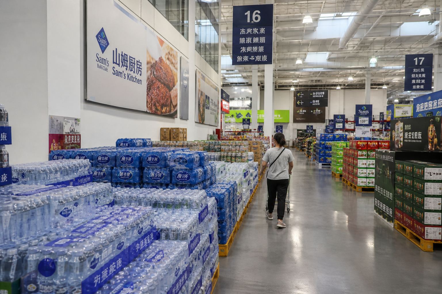 Longgang Sam's Club: bulk water packs in a suburban warehouse.