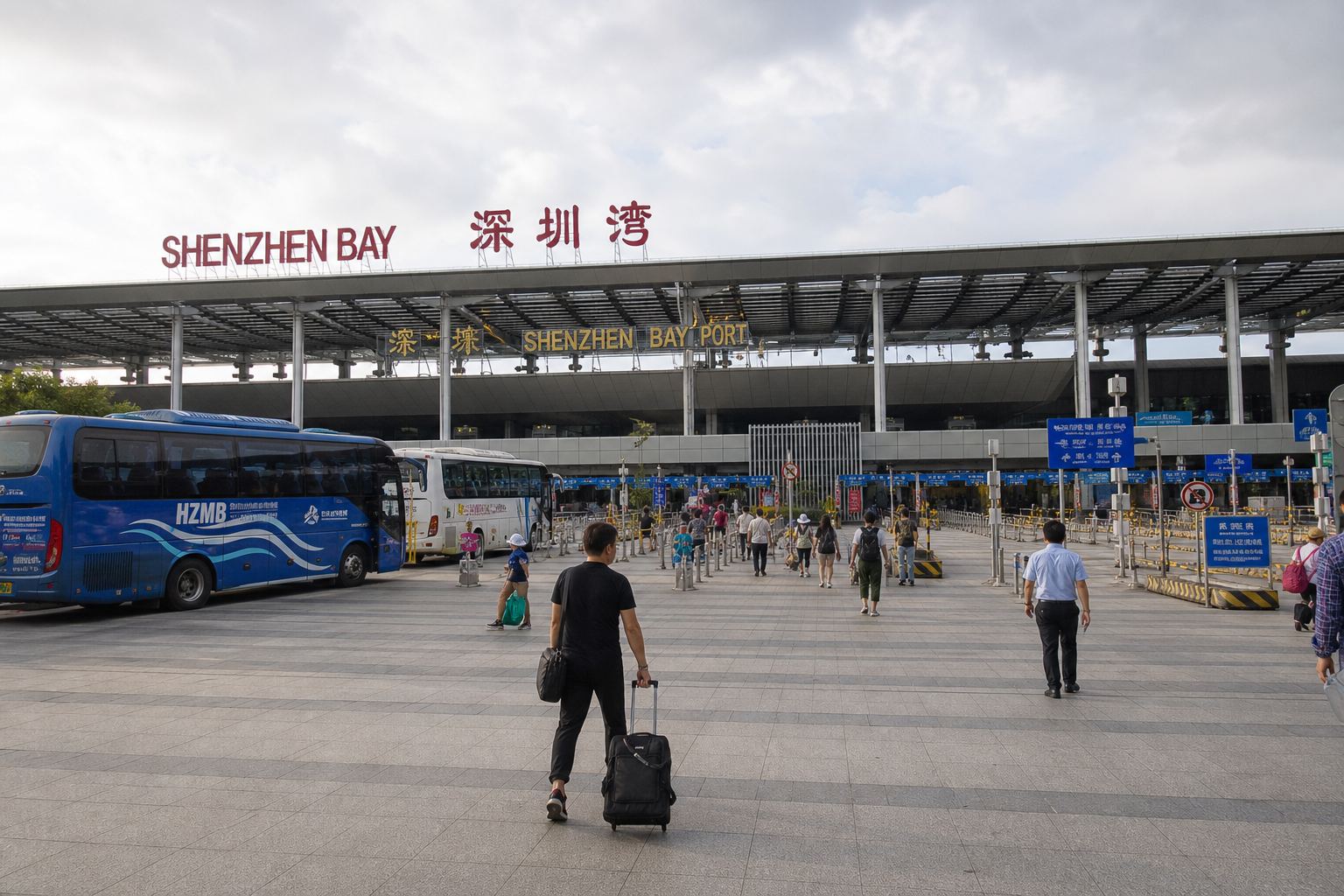Shenzhen Bay Port plaza and checkpoint signs.